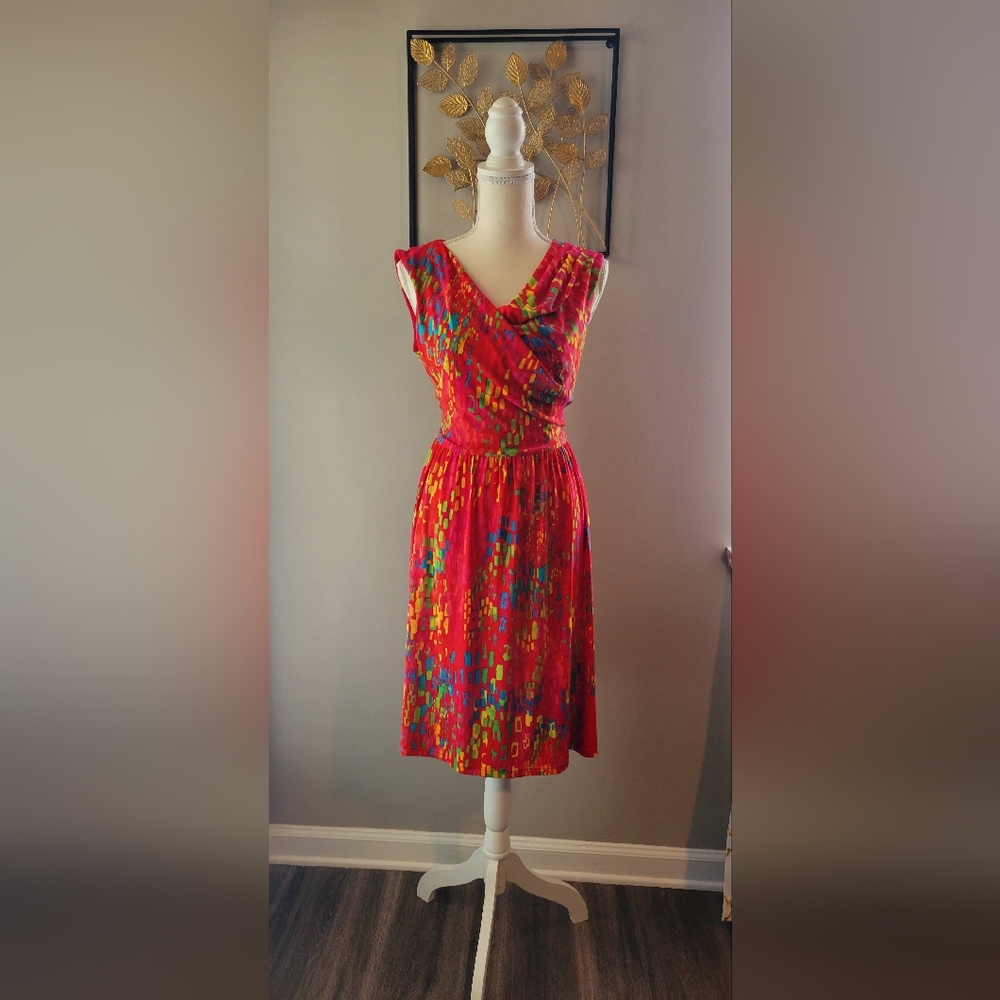 A dress that will get you compliments. It's colorful, classy AND has pockets.